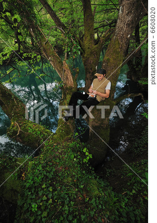 man relaxing outdoor man relaxing outdoor 6608020