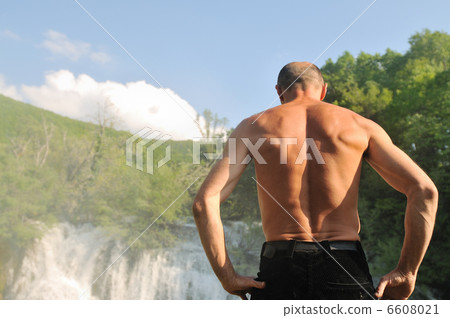 man waterfall man waterfall 6608021