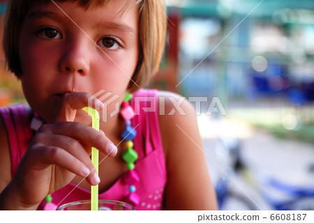 Cute little gilr enjoying cold drink Cute little gilr enjoying cold drink 6608187