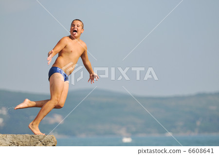 boy jump sea boy jump sea 6608641