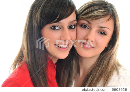 two young girls isolated on white two young girls isolated on white 6608656