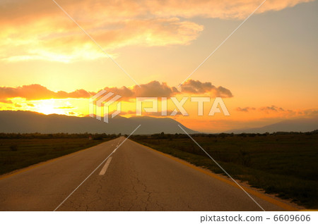 countryroad adventure with beautiful sunset 6609606