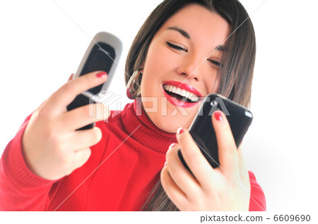 woman in red talking on cellphone woman in red talking on cellphone 6609690