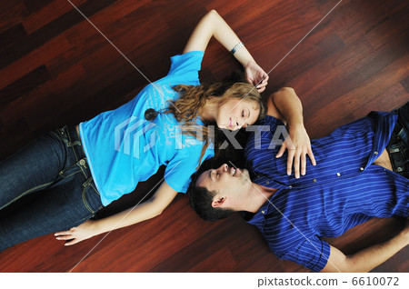 happy couple in empty apartment 6610072