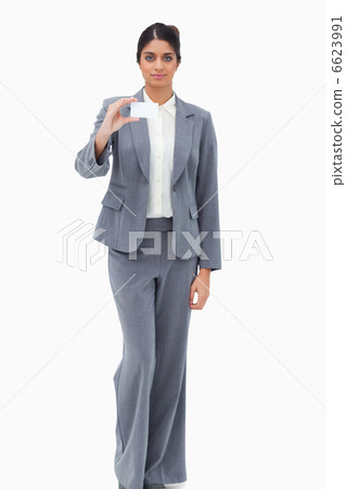 Saleswoman showing blank business card Saleswoman showing blank business card 6623991