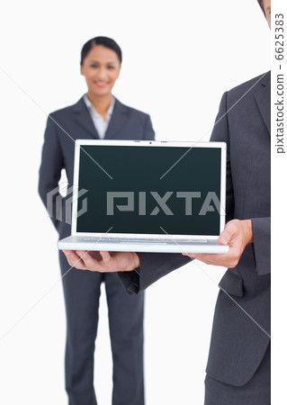 Close up of laptop being presented by salesteam 6625383
