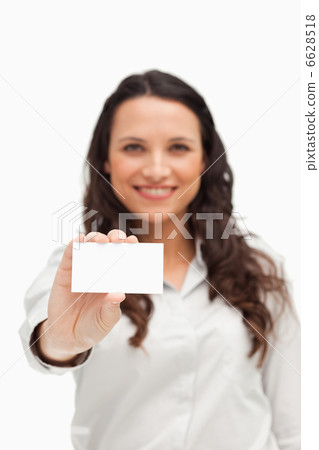 Brunette showing a card 6628518