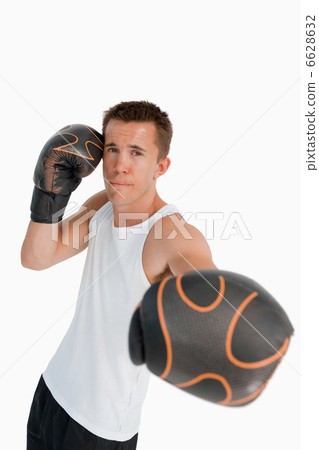 Boxer attacking with his left fist Boxer attacking with his left fist 6628632