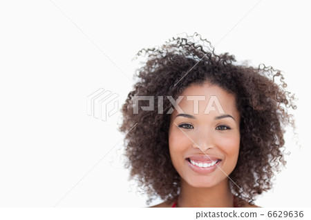 Smiling woman looking straight at the camera 6629636