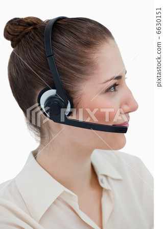 Portrait of an operator posing with a headset 6630151
