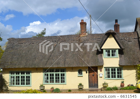 A house with a roofed roof A house with a roofed roof 6631545