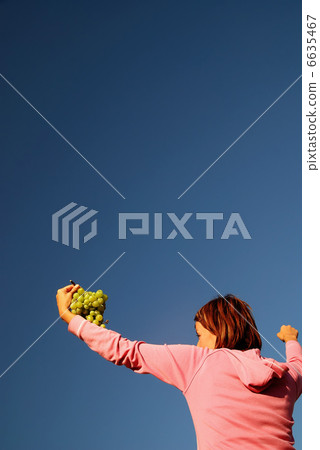 girl with grape outdoor girl with grape outdoor 6635467