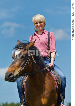 happy woman on horse 6635878
