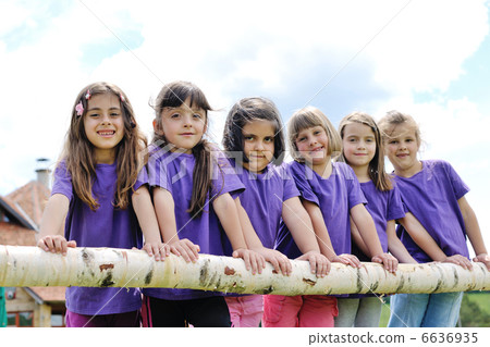 happy kids group have fun in nature 6636935