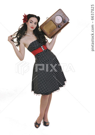 pretty girl listening music on radio 6637825