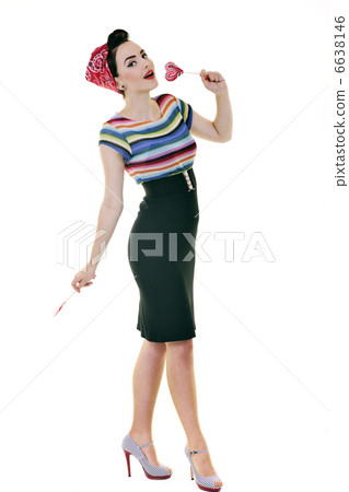 pretty young happy woman with travel bag waiting and posing isol pretty young happy woman with travel bag waiting and posing isol 6638146
