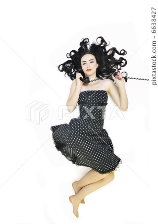 pretty girl talking on old phone pretty girl talking on old phone 6638427