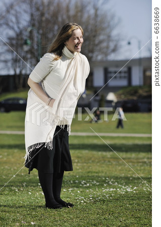 happy young pregnant woman outdoor 6638669