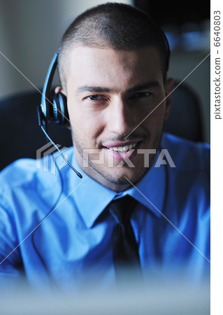 businessman with a headset businessman with a headset 6640803