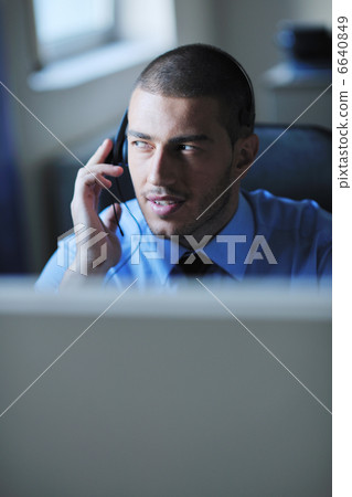 businessman with a headset businessman with a headset 6640849