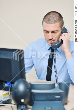 businessman with a headset businessman with a headset 6641052