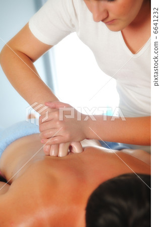 back massage at the spa and wellness center 6641232