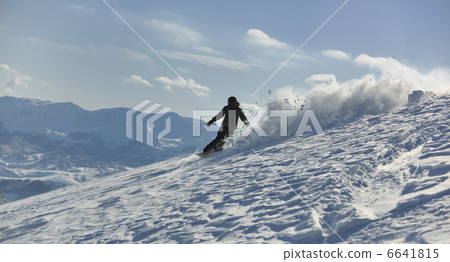 freestyle snowboarder jump and ride freestyle snowboarder jump and ride 6641815