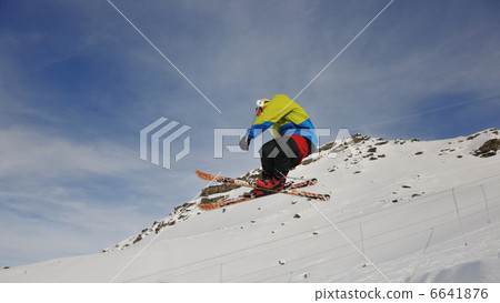 happy young man have fun at winter on mountain peak happy young man have fun at winter on mountain peak 6641876