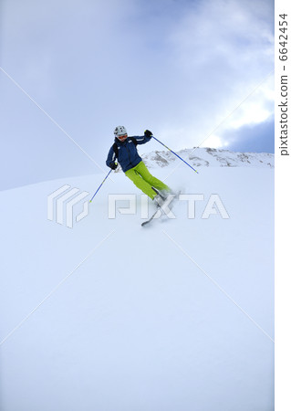 skiing on fresh snow at winter season at beautiful sunny day skiing on fresh snow at winter season at beautiful sunny day 6642454