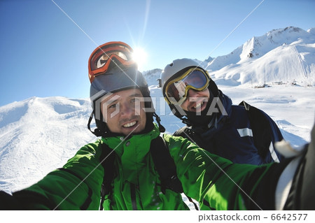 winter portrait of friends at skiing winter portrait of friends at skiing 6642577