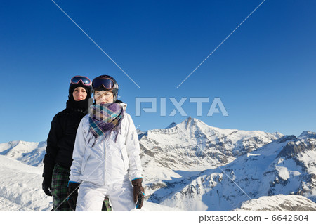 winter portrait of friends at skiing winter portrait of friends at skiing 6642604