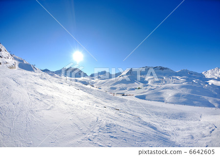 High mountains under snow in the winter High mountains under snow in the winter 6642605