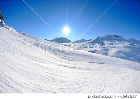 High mountains under snow in the winter High mountains under snow in the winter 6642637