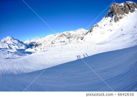 High mountains under snow in the winter High mountains under snow in the winter 6642638