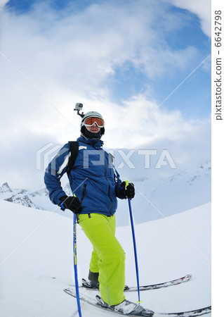 skiing on fresh snow at winter season at beautiful sunny day skiing on fresh snow at winter season at beautiful sunny day 6642798