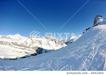 High mountains under snow in the winter High mountains under snow in the winter 6642804