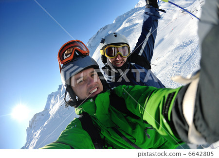 winter portrait of friends at skiing winter portrait of friends at skiing 6642805