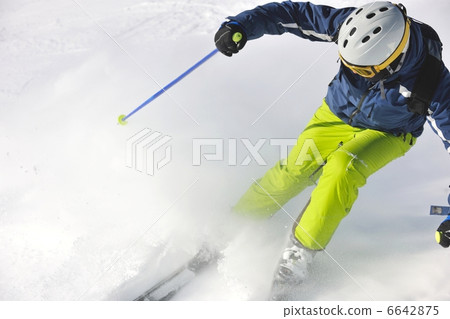 skiing on fresh snow at winter season at beautiful sunny day skiing on fresh snow at winter season at beautiful sunny day 6642875