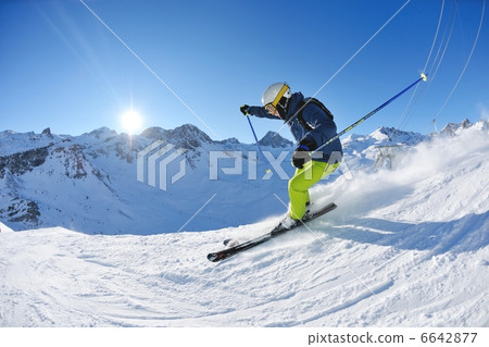 skiing on fresh snow at winter season at beautiful sunny day skiing on fresh snow at winter season at beautiful sunny day 6642877