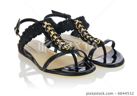 Woman sandals isolated on the white 6644532
