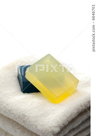 Stacked towels and soap Stacked towels and soap 6646701
