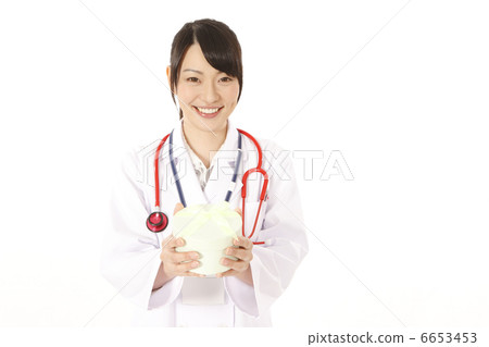 Female doctor / nurse celebrating discharge from the hospital 6653453
