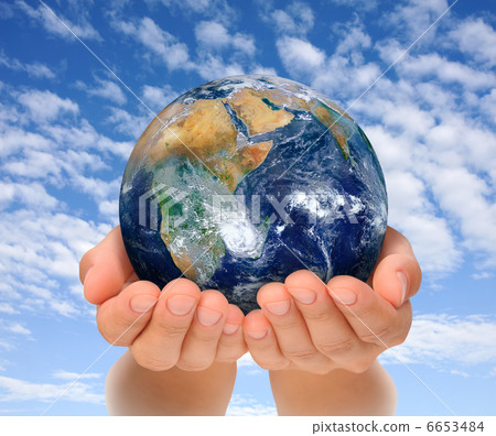 Hands of woman holding globe, Africa and Near East. Earth image courtesy of NASA Hands of woman holding globe, Africa and Near East. Earth image courtesy of NASA 6653484