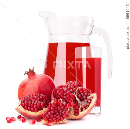Pomegranate fruit juice in glass pitcher Pomegranate fruit juice in glass pitcher 6661443