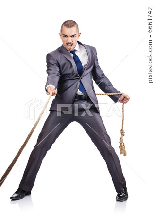 Man pulling the rope on white 6661742
