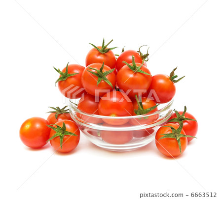 cherry tomatoes in a glass bowl on a white background cherry tomatoes in a glass bowl on a white background 6663512
