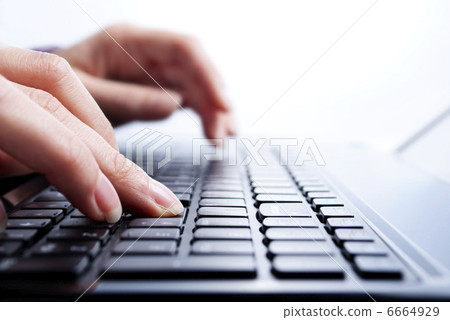 Stock Photo: writing on laptop