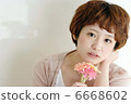 Girl with flowers 6668602