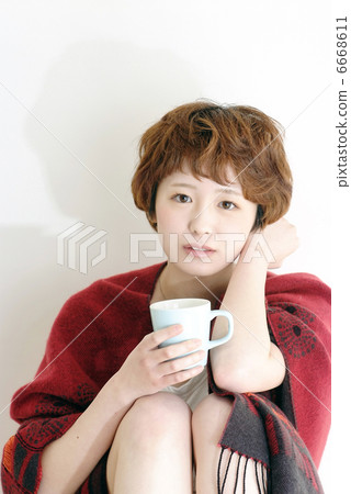 A girl with a mug A girl with a mug 6668611