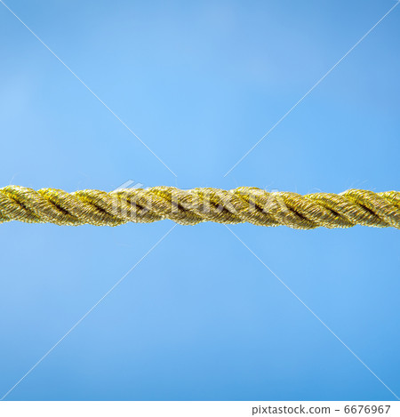 Gold rope on blue Gold rope on blue 6676967
